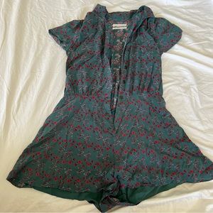 Urban Outfitters Flowy short floral romper. V neck.
